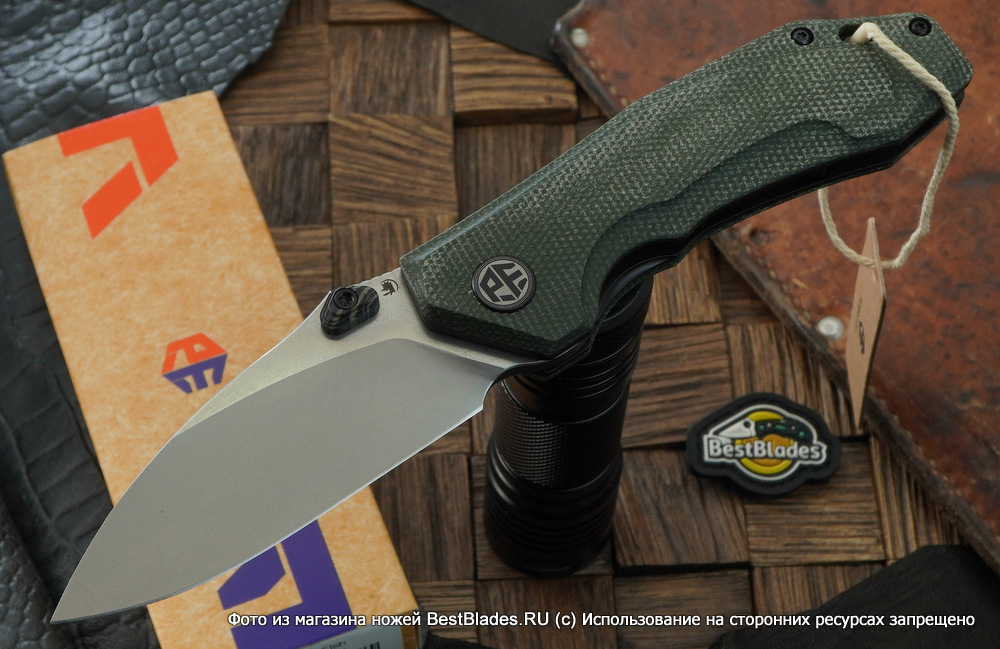 фото Складной нож petrified fish pfp04 havrog, сталь к110, рукоять зеленая микарта