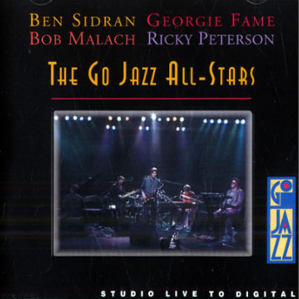 The Go Jazz All Stars - Ben Sidran, Georgie Fame, Bob Malach, Ricky Peterson – Live In Ja
The Go Jazz All Stars - Ben Sidran, Georgie Fame, Bob Malach, Ricky Peterson – Live In Ja