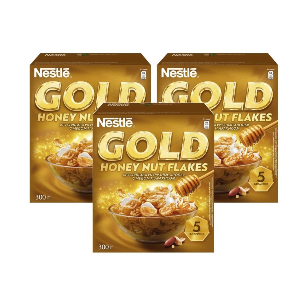 Nestle gold honey nut flakes. Хлопья Голд Флейкс. Хлопья Nestle Gold, кукурузные с медом и арахисом, 300 г. Готовый завтрак Gold Honey nut Flakes 300 г. Nestle Gold Flakes хлопья.