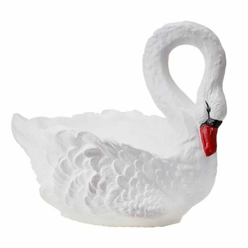 Вырезать лебедя из покрышки. Торт «лебеди». Кашпо лебедь. Кашпо для цветов лебедь. Лебедь фото.