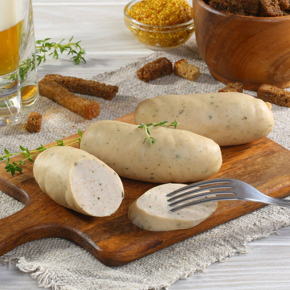 ремит колбаски мюнхенские белые. Weisswurst белая баварская колбаса. баварские (мюнхенские) колбаски. мюнхенские колбаски в кастрюле. мюнхенские сосиски.