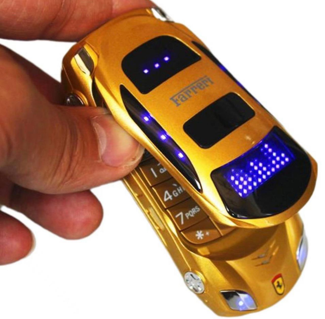 Раскладной телефон в виде Машинки Sebar золотой цвет, купить в Москве, цены  в интернет-магазинах на Мегамаркет