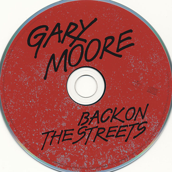 Gary moore перевод. Back on the Streets Гэри Мур. Gary Moore back on the Streets. A different Beat Гэри Мур. Gary Moore uk Trainer.