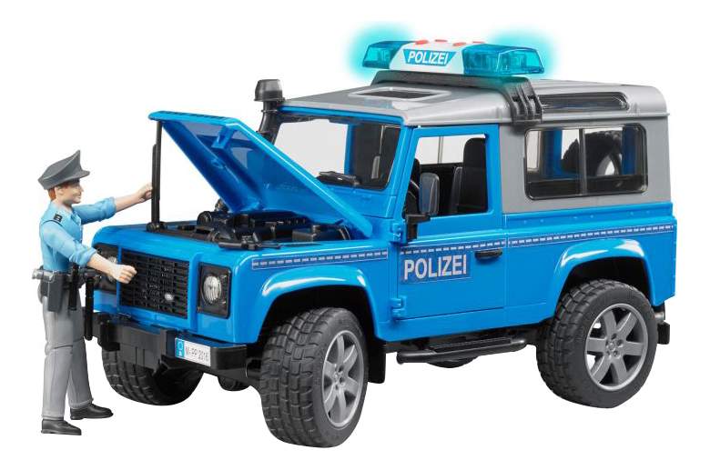 Внедорожник Bruder Land Rover Defender Station Wagon Полицейская с фигуркой