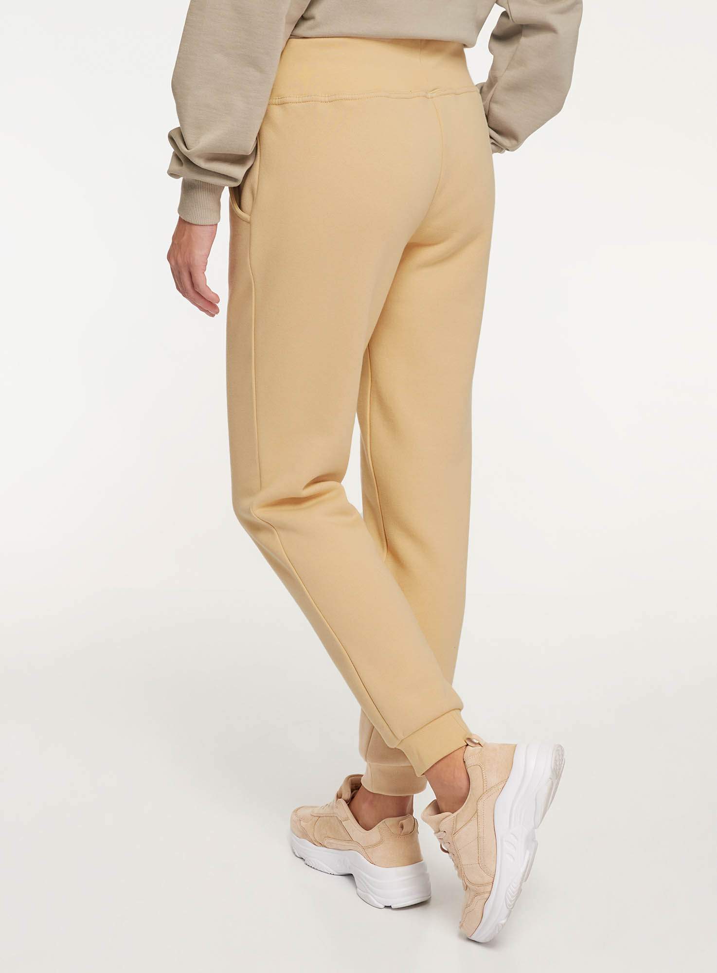 Спортивные брюки женские oodji 16700030-25B бежевые XL