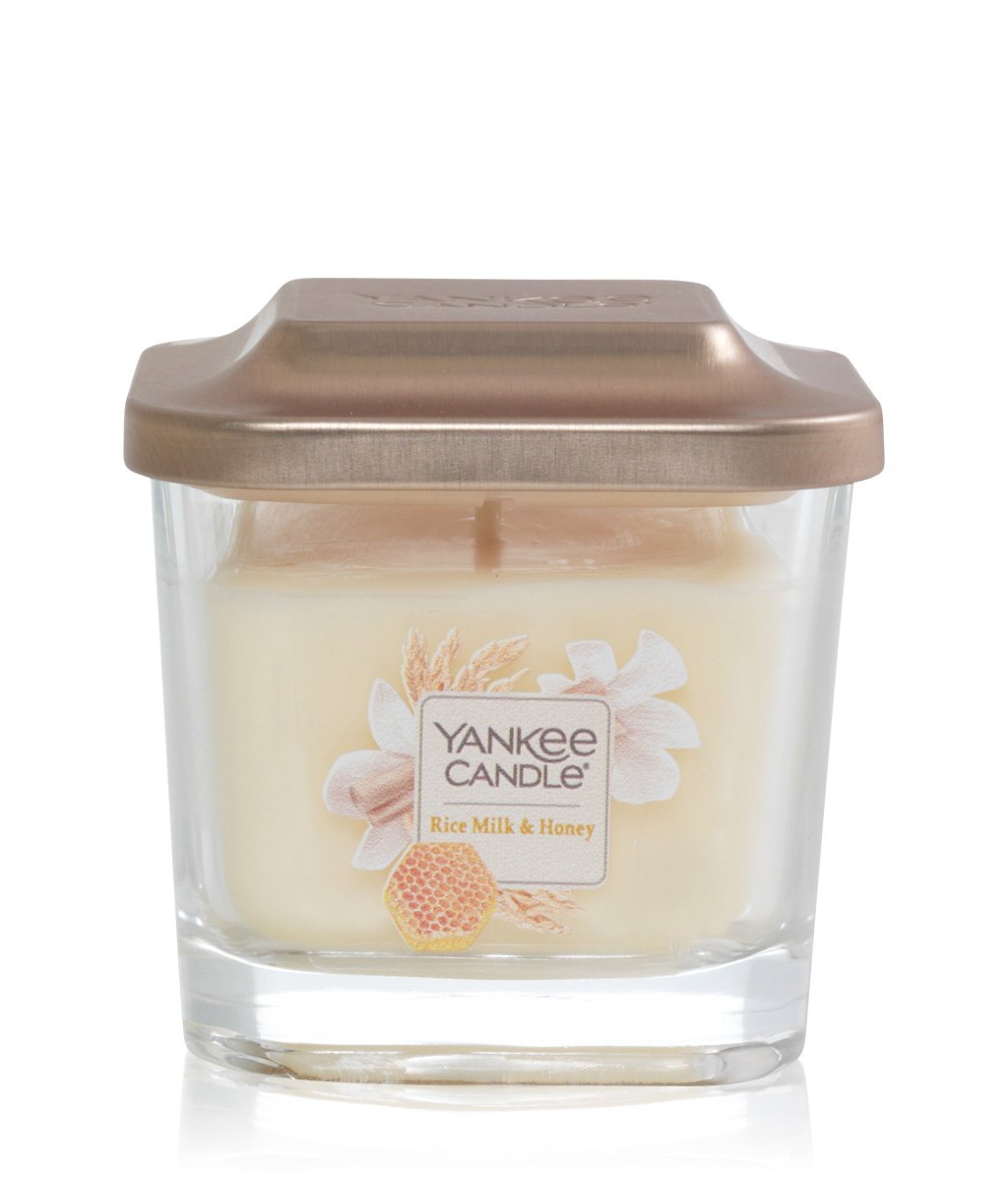 фото Свеча ароматическая yankee candle elevation мед и рисовое молоко 18-28 ч