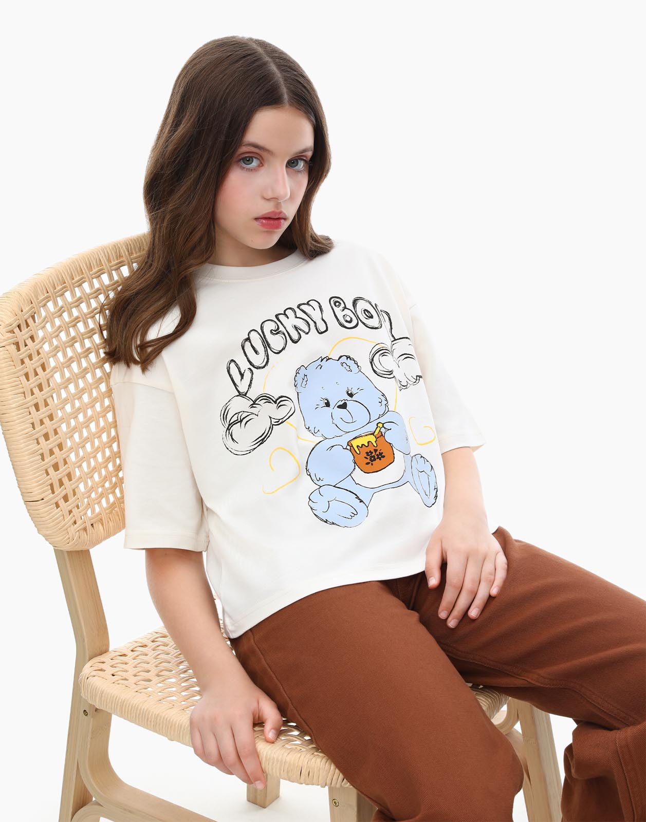 Молочная укороченная футболка oversize с принтом для девочки Gloria Jeans 5-6л/116