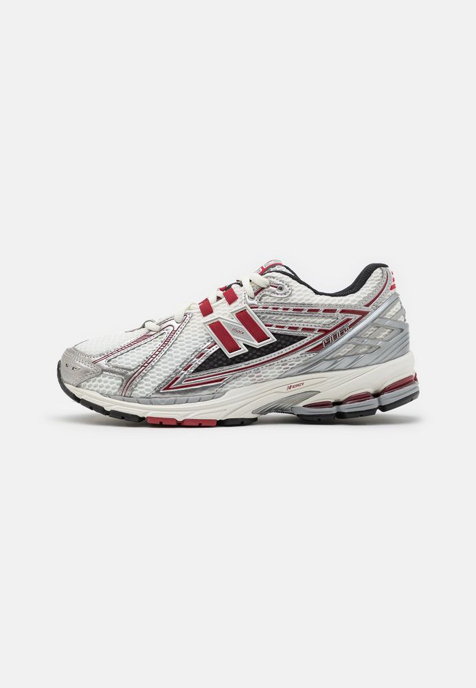 

Кроссовки унисекс New Balance NE215O0FF серебристые 41 EU, Серебристый, NE215O0FF