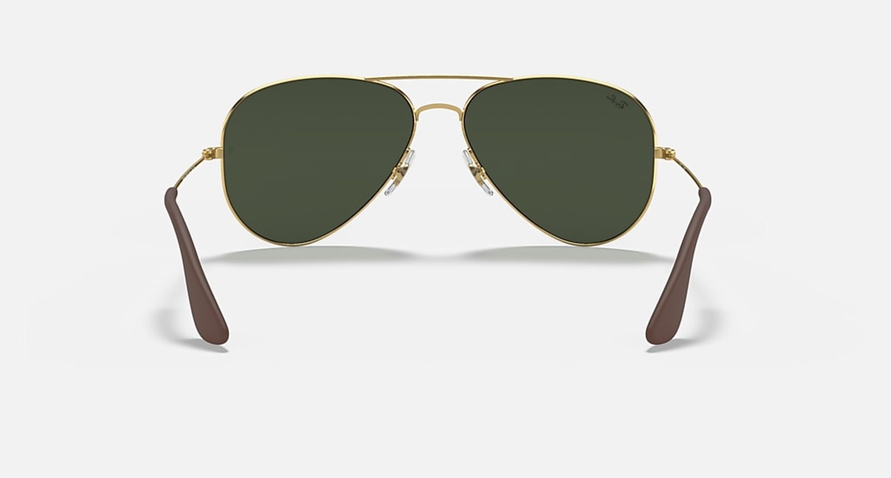 

Солнцезащитные очки унисекс Ray-Ban RB3558 золотые, RB3558