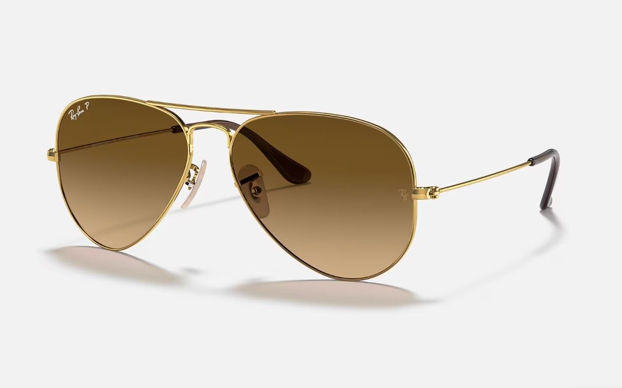 

Солнцезащитные очки унисекс Ray-Ban 1RB3025-001 коричневые, 1RB3025-001