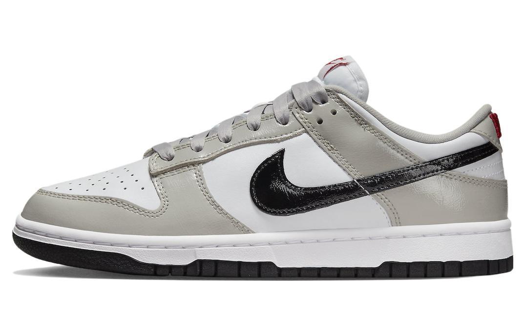 

Кеды унисекс Nike Dunk Low ESS Light Iron Ore белые 41 EU, Белый, Dunk Low ESS Light Iron Ore