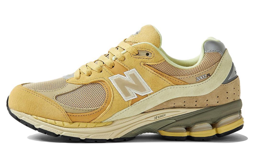 

Кроссовки унисекс New Balance AURALEE NB 2002R желтые 42 EU, Желтый, AURALEE x New Balance NB 2002R