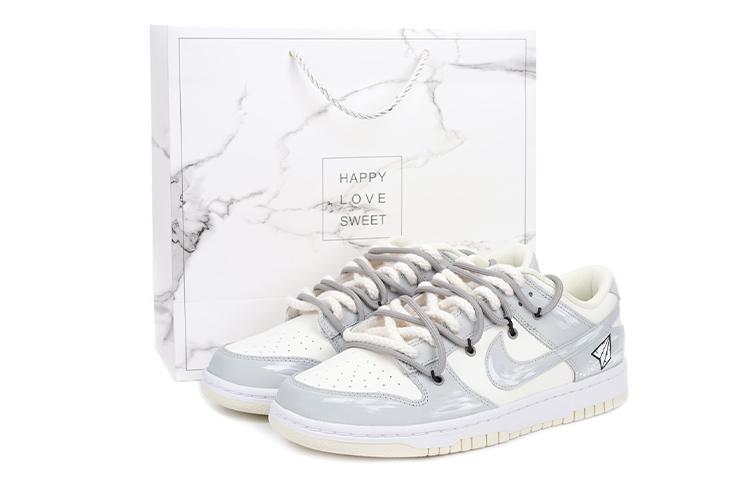 

Кеды унисекс Nike Dunk Low retro coconut milk vibe белые 41 EU, Белый, Dunk Low retro coconut milk vibe