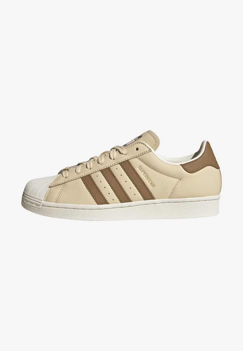 

Кеды унисекс Adidas AD115O1OA бежевые 42 2/3 EU, Бежевый, AD115O1OA