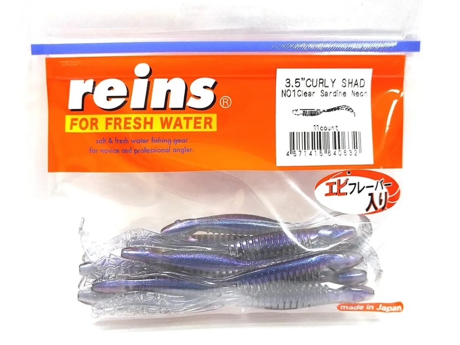 

Силиконовая приманка REINS CURLY SHAD 3.5" Цв. N01-Clear Sardine Neon, Прозрачный;фиолетовый, Curly Shad