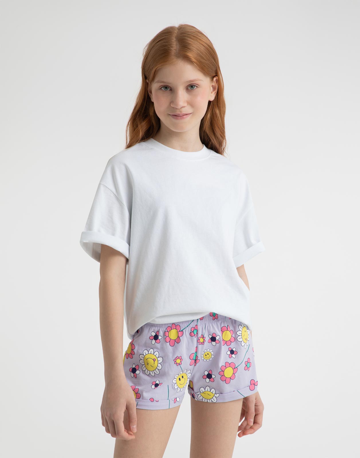 Светло-лиловые шорты с цветочным принтом для девочки р.164