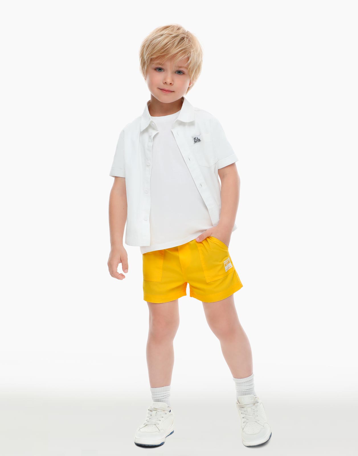 Жёлтые шорты с нашивкой для мальчика р.80