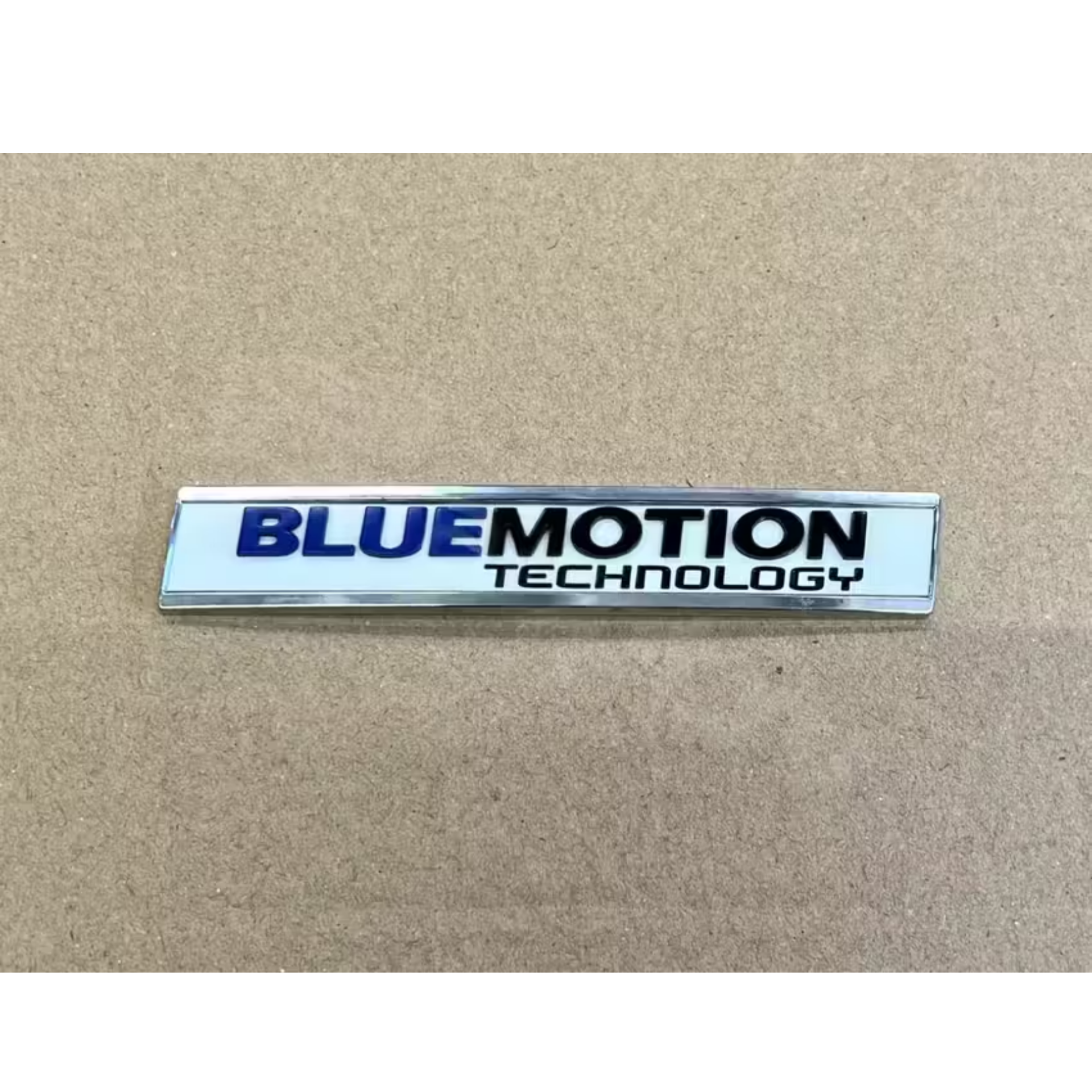 

Эмблема надпись BLUE MOTION VAG 5N0853675MCWB для Volkswagen Tiguan