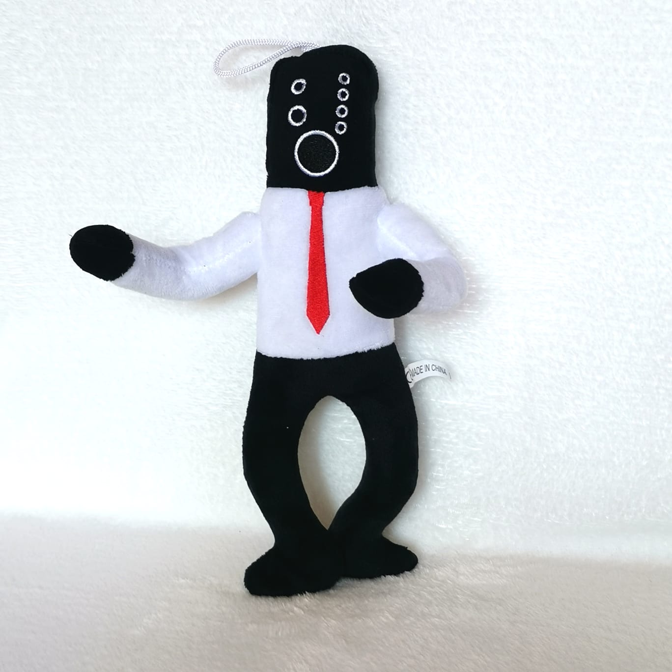 Игрушка Ermelenatoys Большой Агент-Колонка, герой сериала Skibidi toilet, белый, черный