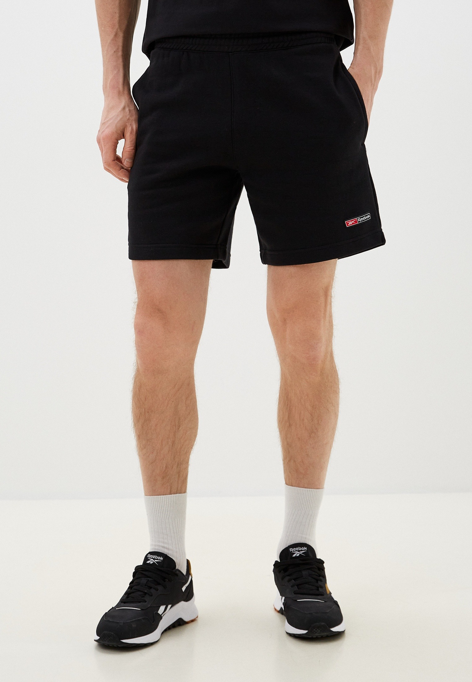 

Шорты мужские Reebok Identity Logo Mash Up Shorts черные S, Черный, Identity Logo Mash Up Shorts