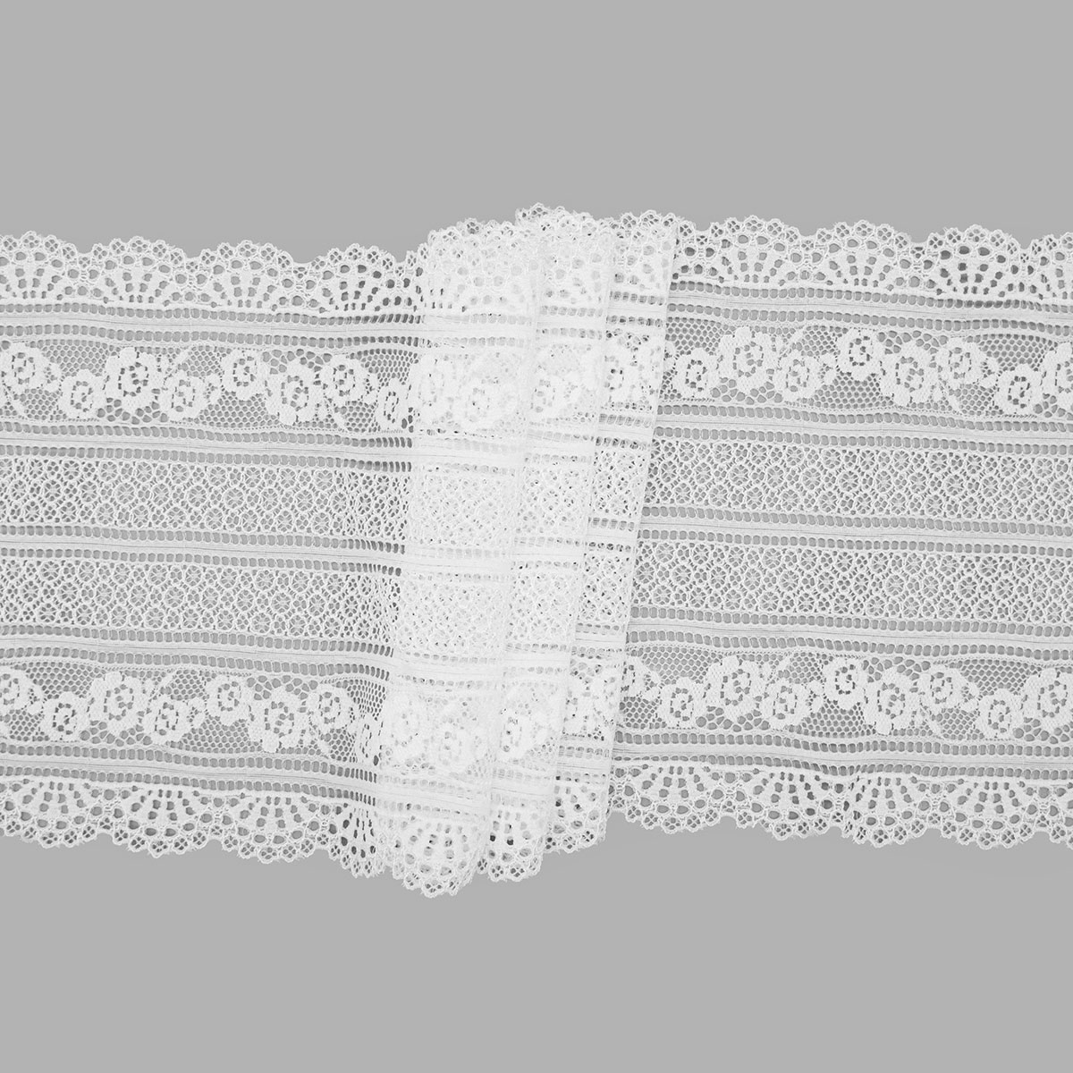 

WT00594 Кружево эластичное 22,5см*10м, белый