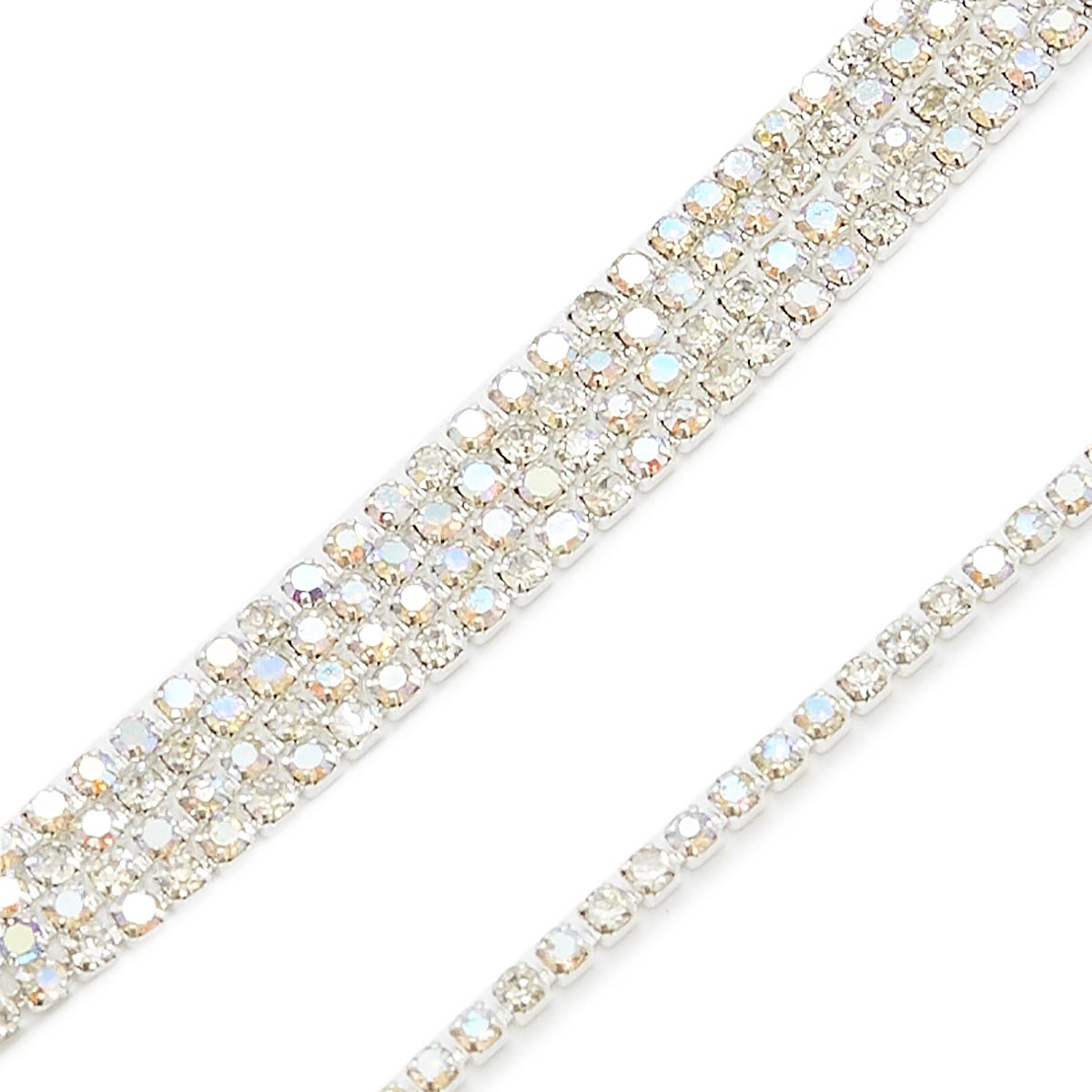 

Стразы АЙРИС SS6,5 в серебристой оплётке (металл), 2 мм*9,14 м, прозрачные с АВ покрытием, Прозрачный