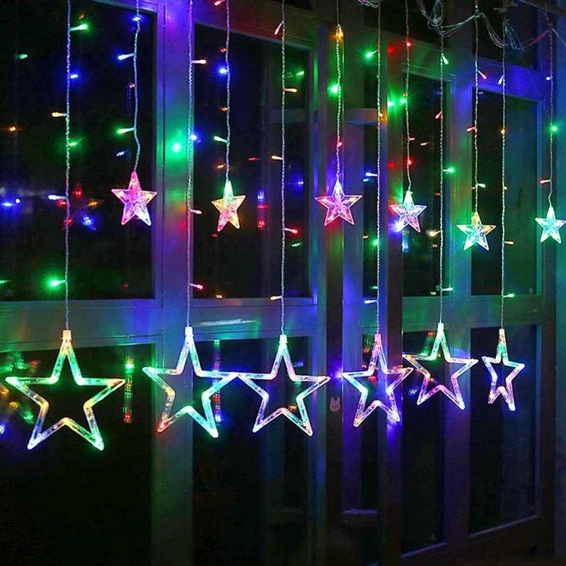 фото Новогодняя светодиодная гирлянда штора звездочки 3 х 1 м, цветной baziator