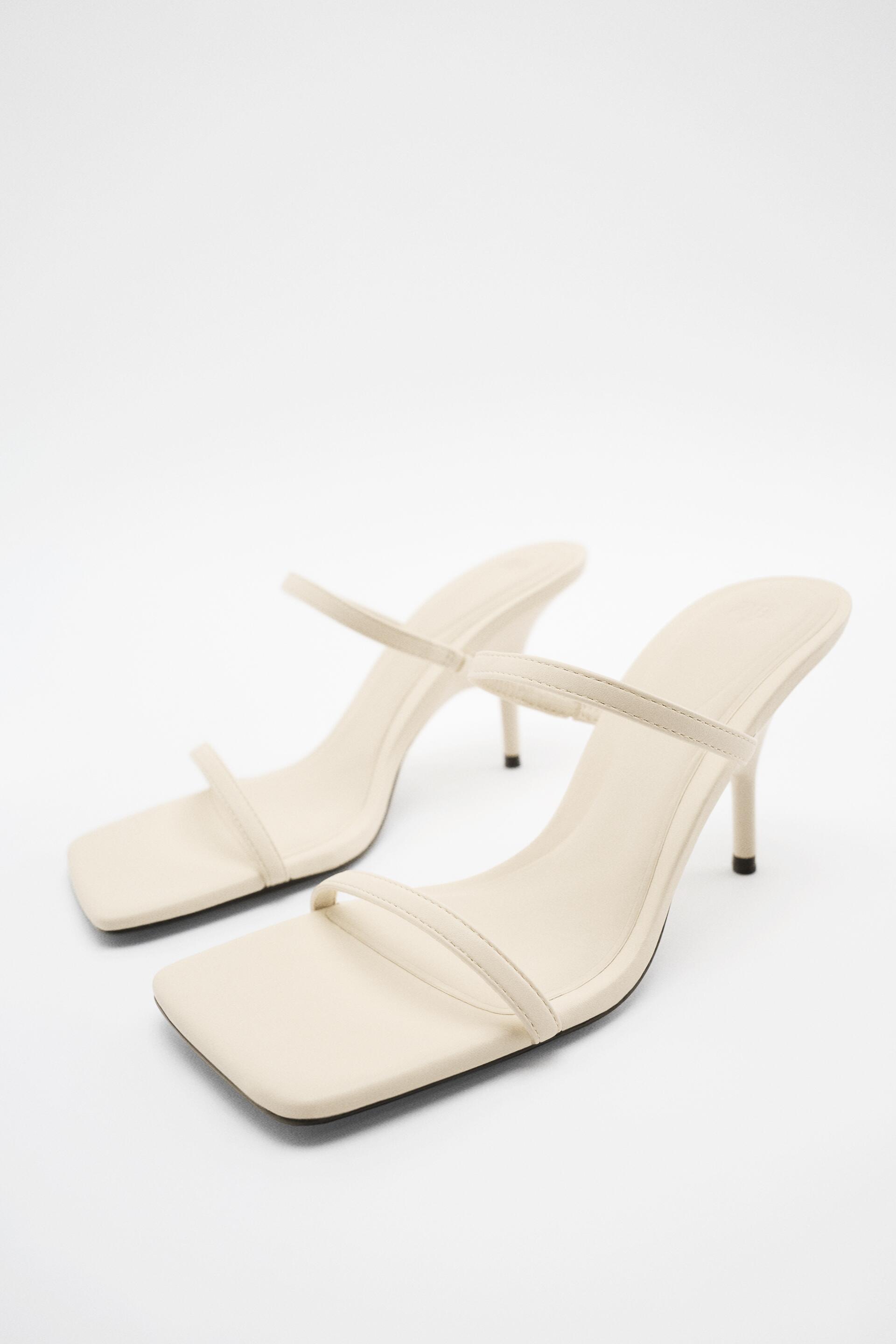 

Шлепанцы женские ZARA 13334010 белые 37 RU (доставка из-за рубежа), 13334010