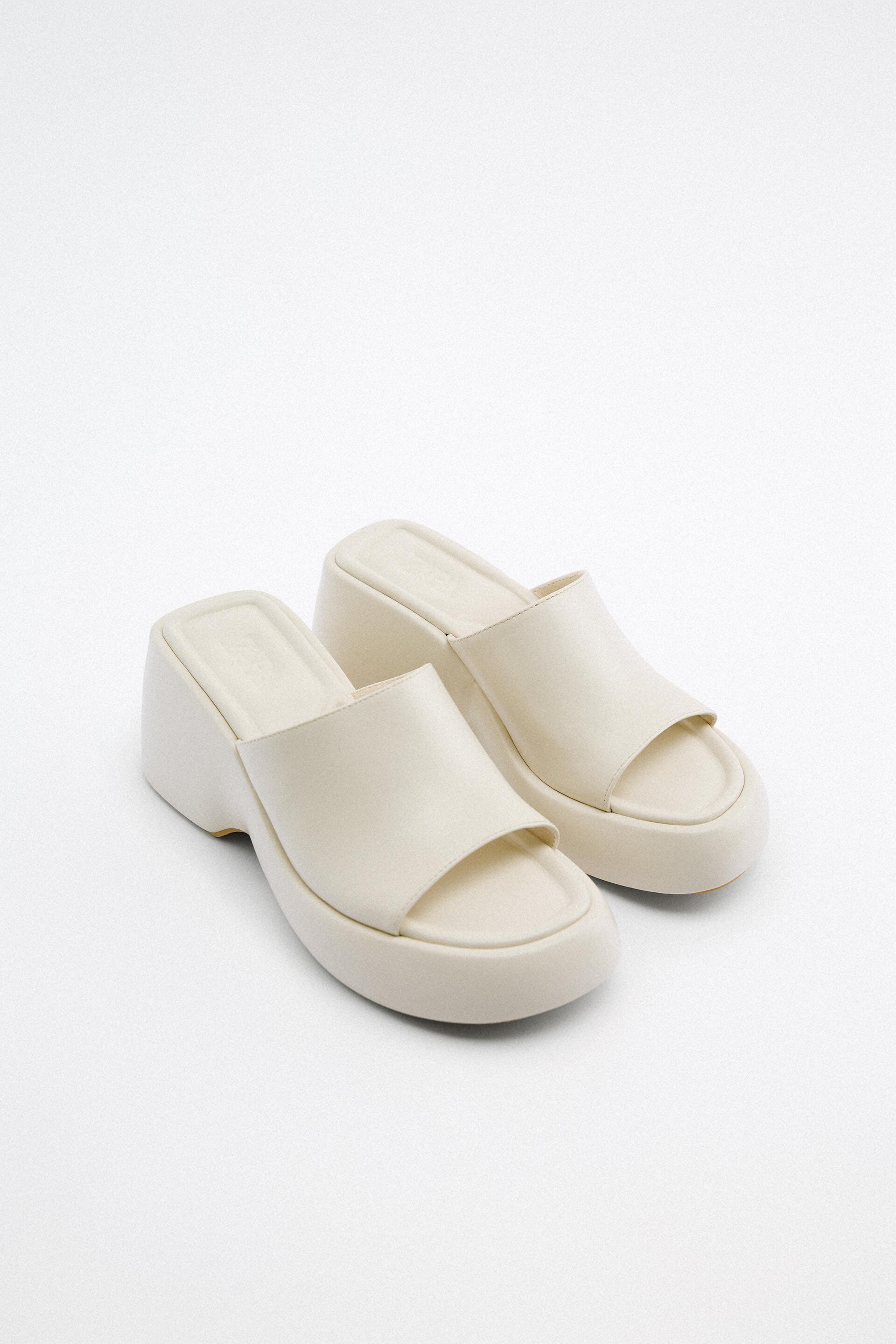 

Шлепанцы женские ZARA 177674 белые 40 RU (доставка из-за рубежа), 177674