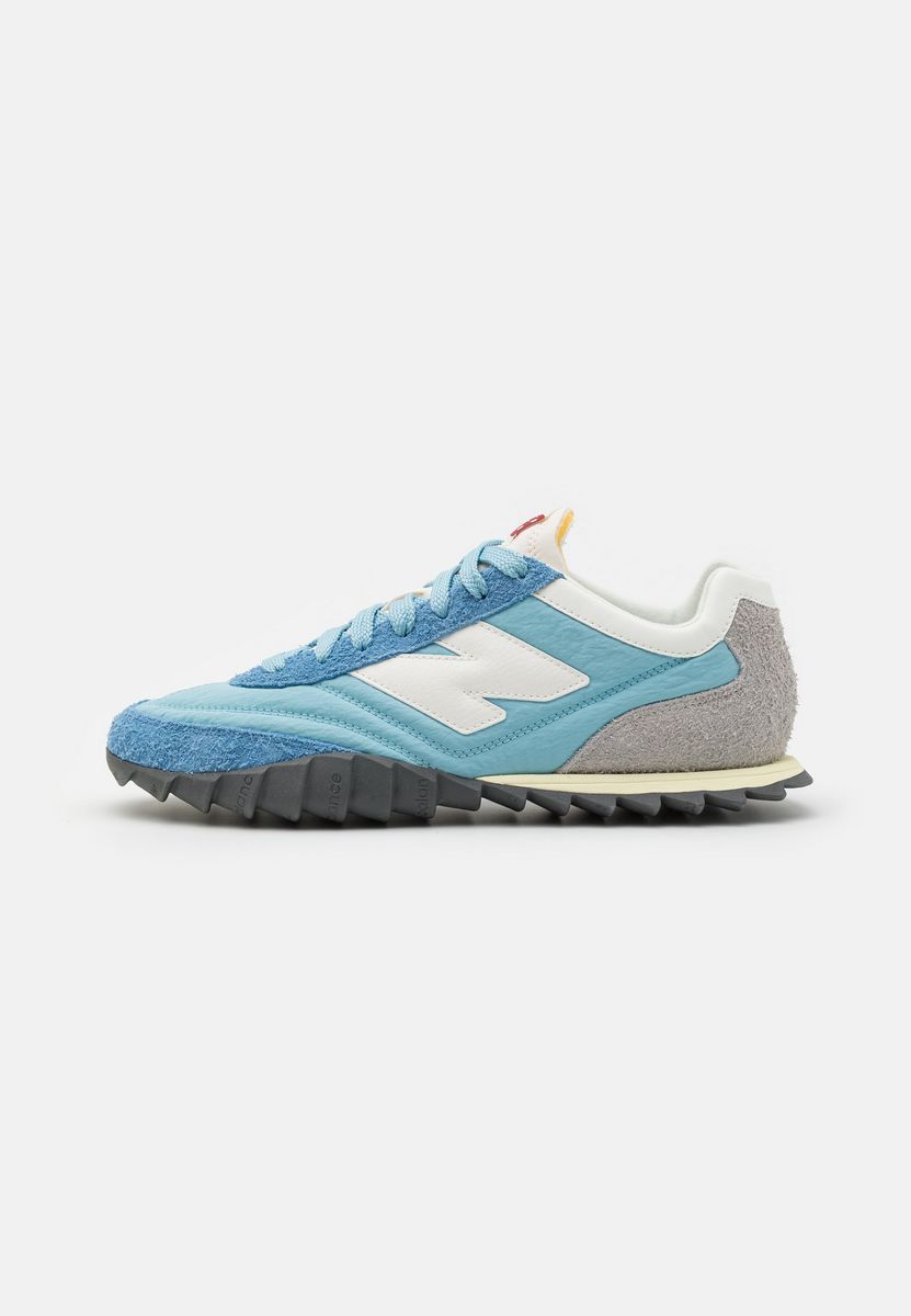 

Кроссовки унисекс New Balance NE215O0FH голубые 43 EU, Голубой, NE215O0FH