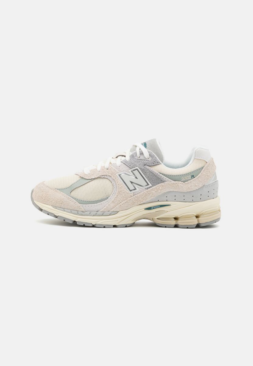 

Кроссовки унисекс New Balance NE215O0FG бежевые 42 EU, NE215O0FG