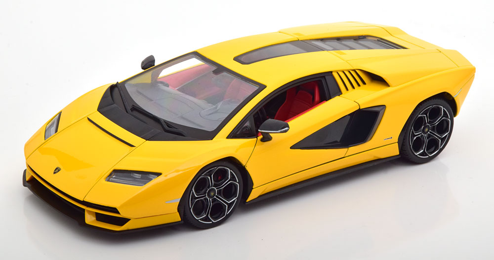 Игрушечная машинка Kinsmart Lamborghini Countach LPI 800-4 1:38 желтая инерц УТ0058172