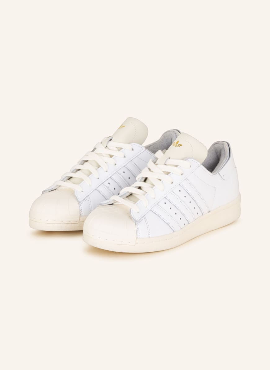 

Кеды унисекс Adidas 1001322564 белые 40 RU (доставка из-за рубежа), 1001322564