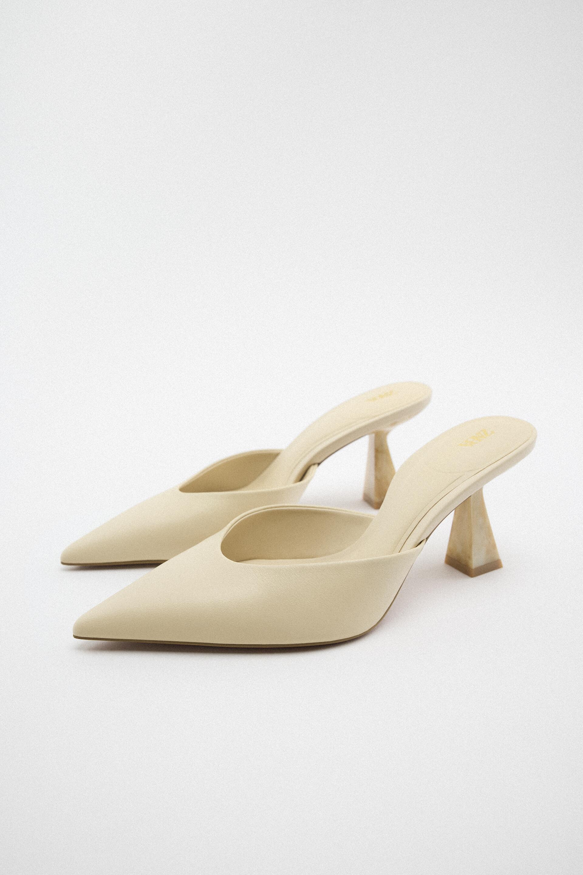 

Шлепанцы женские ZARA 185978 бежевые 39 RU (доставка из-за рубежа), 185978