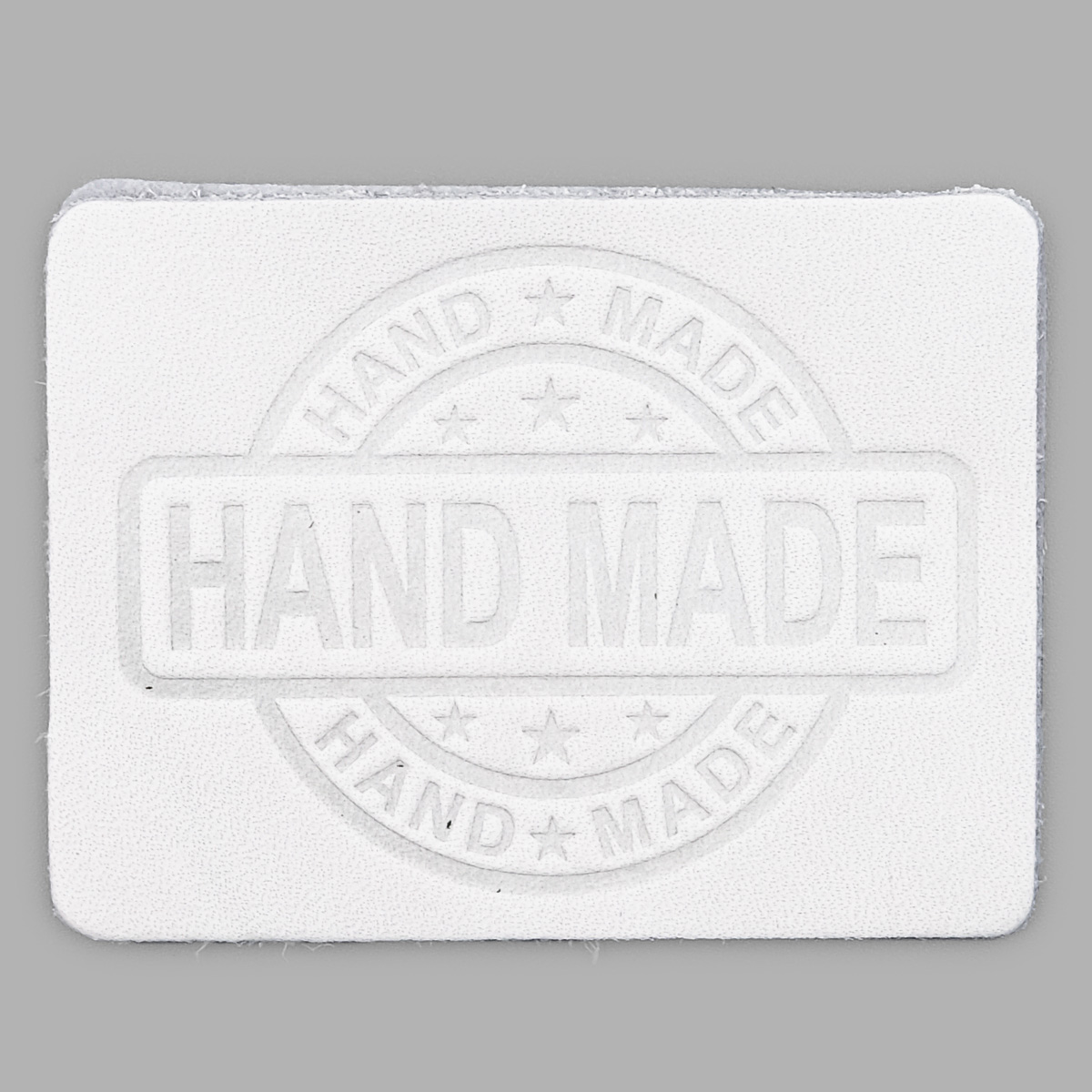 

38 Термоаппликация из кожи Hand Made 7*5,25см, 100% кожа (44 белый), 559432