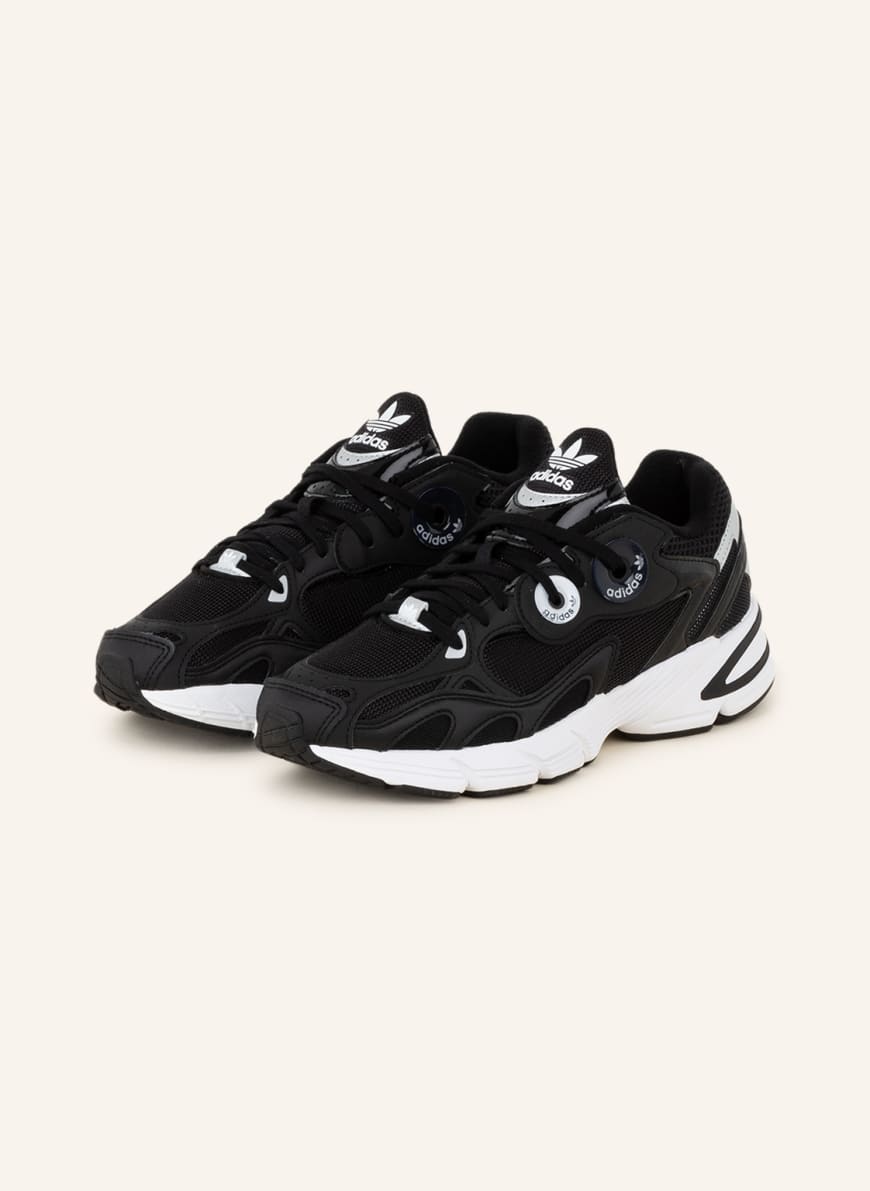 

Кроссовки женские Adidas 1001233993 черные 40 RU (доставка из-за рубежа), 1001233993