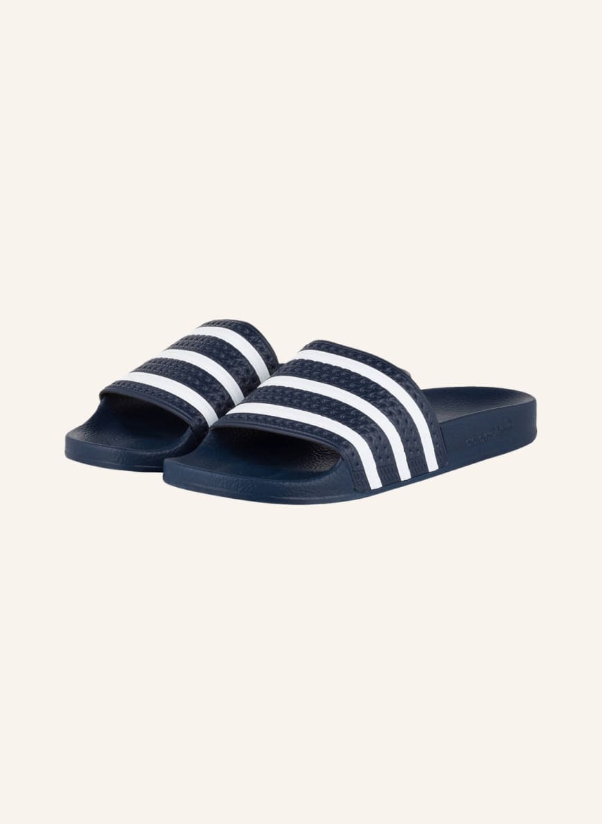 

Сланцы унисекс Adidas 1000898211 синие 43 EU (доставка из-за рубежа), Синий, 1000898211