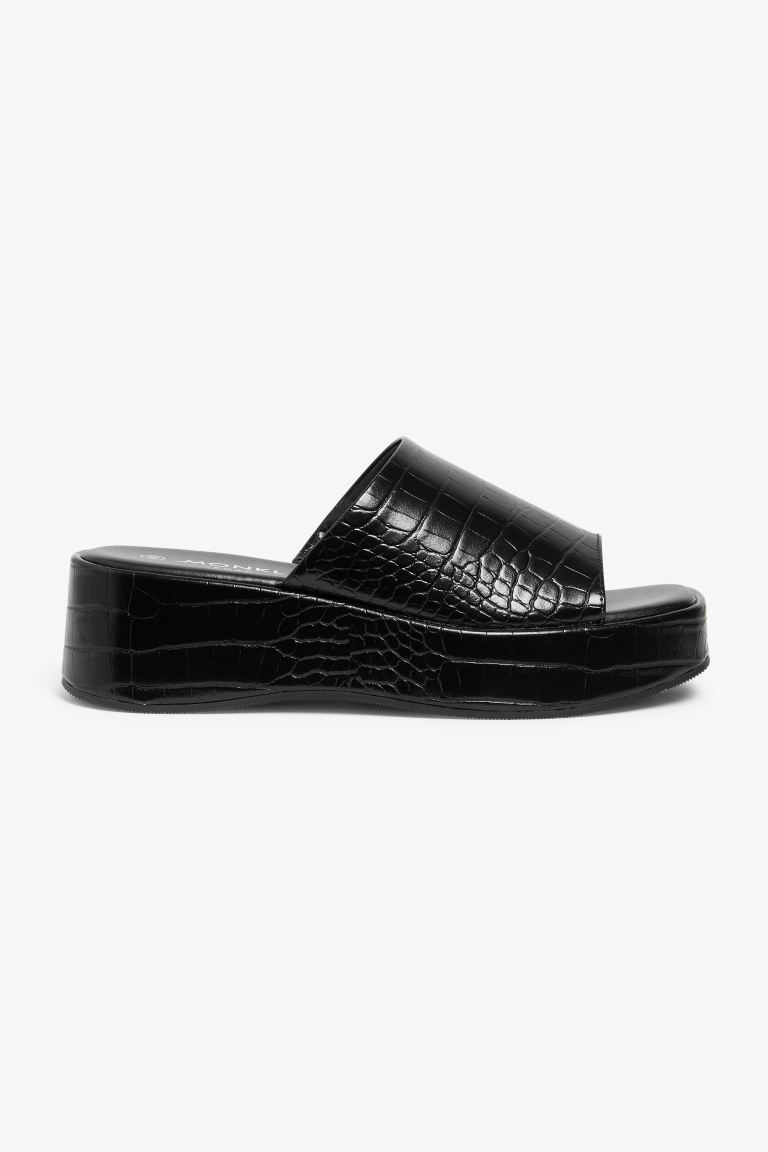

Сабо женские Monki 1049582 черные 41 EU (доставка из-за рубежа), Черный, 1049582