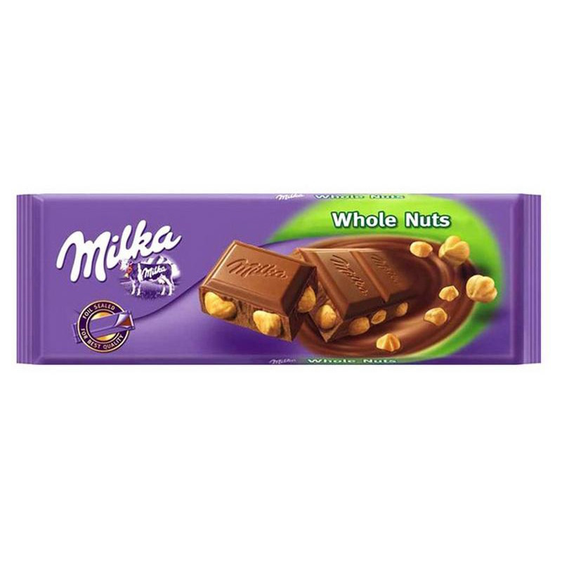 Молочный шоколад Milka Whole Nuts с цельным фундуком 250 грамм Упаковка 12 шт