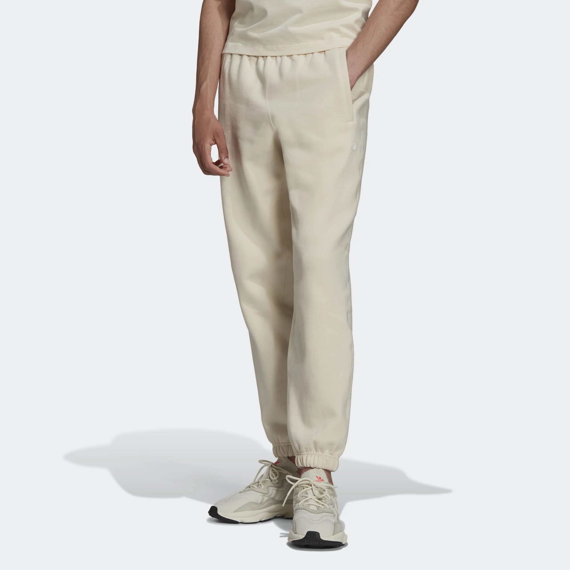 фото Спортивные брюки женские adidas hd2752 бежевые m