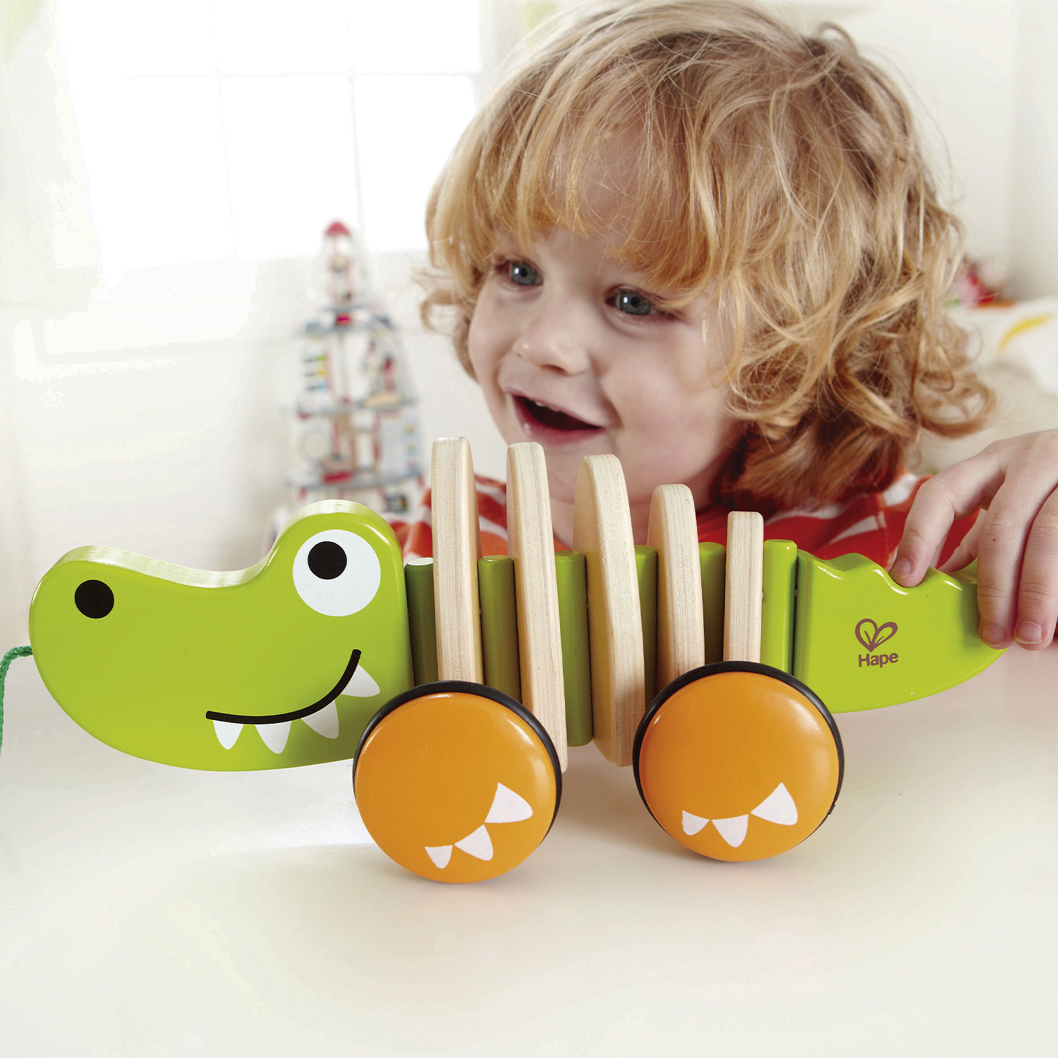 Развивающая игрушка-каталка Hape Крокодил E0348_HP