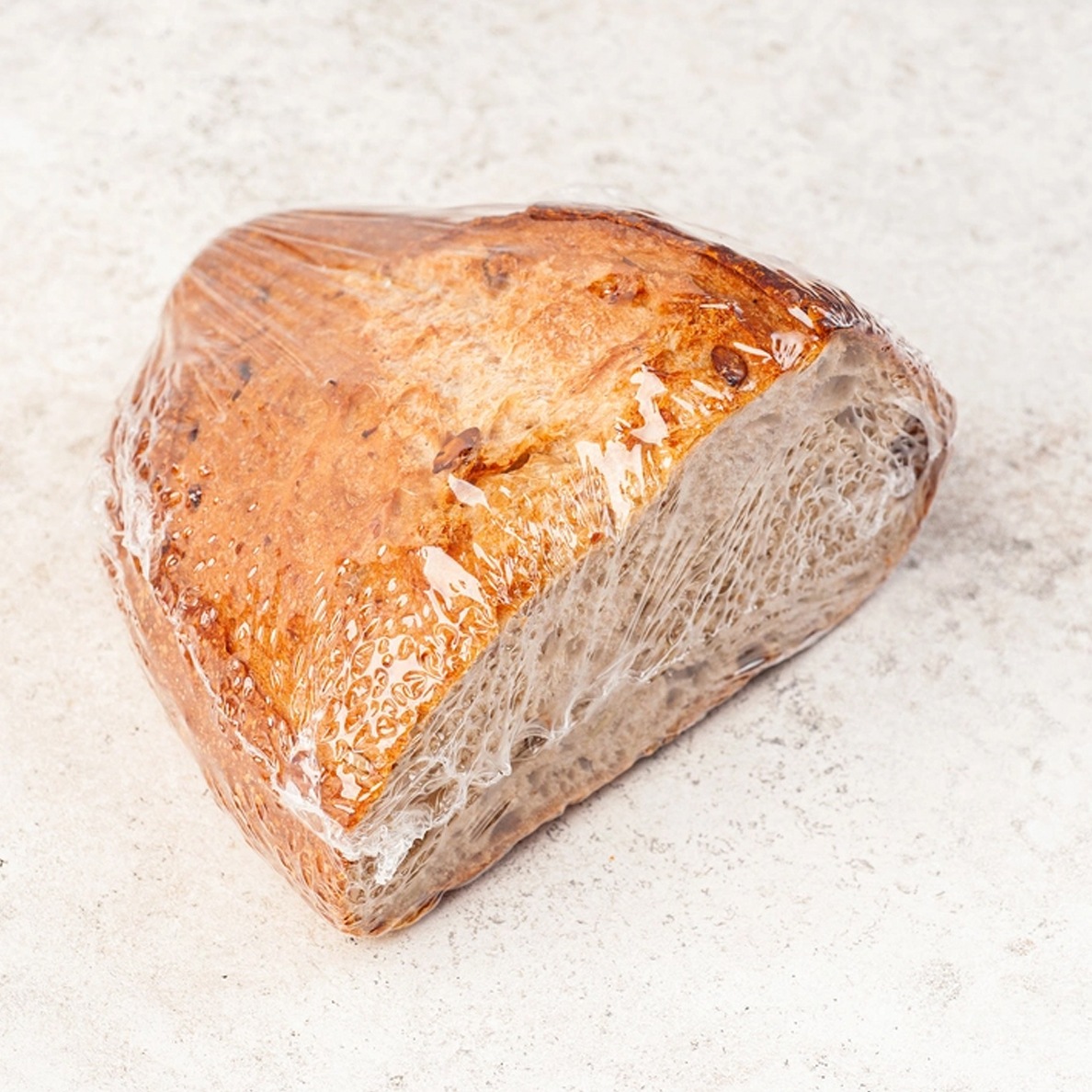 Хлеб пшеничный бездрожжевой половинка в нарезке с семенами тыквы 300 г