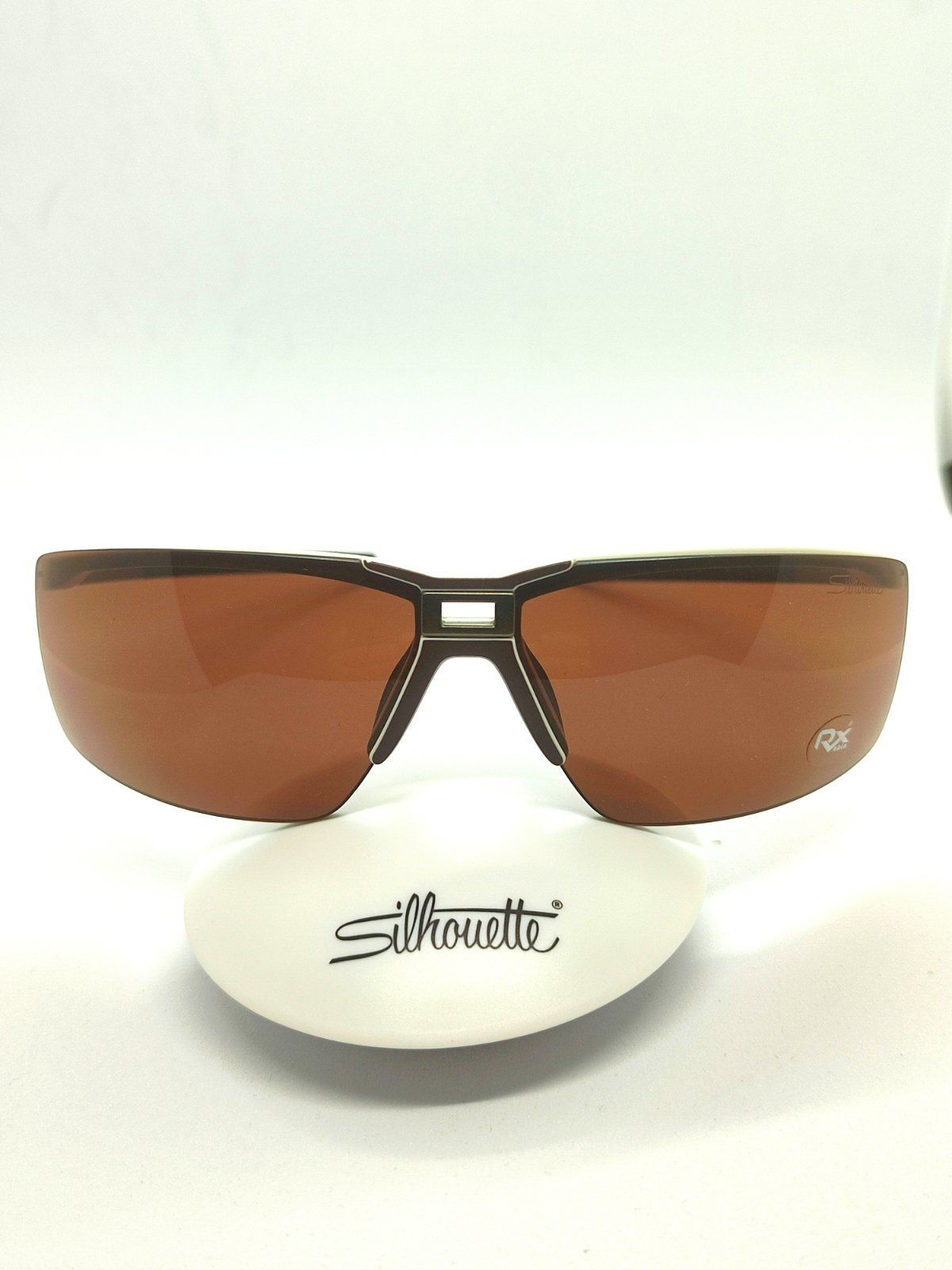 Солнцезащитные очки унисекс Silhouette 4057 коричневые/серебристые