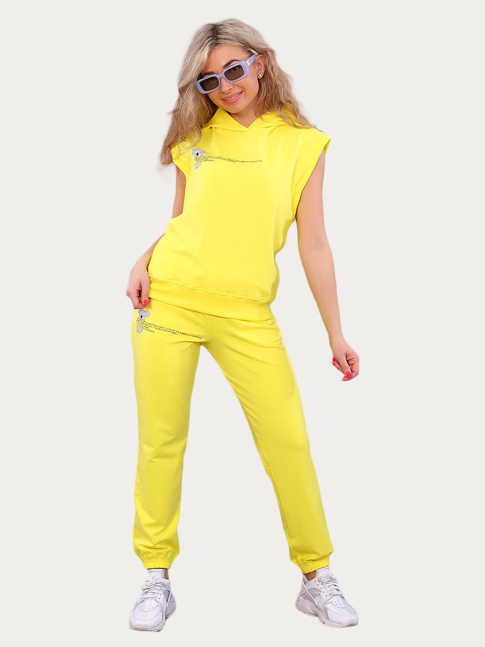 

Костюм женский Natali Natali желтый 48 RU, 15320