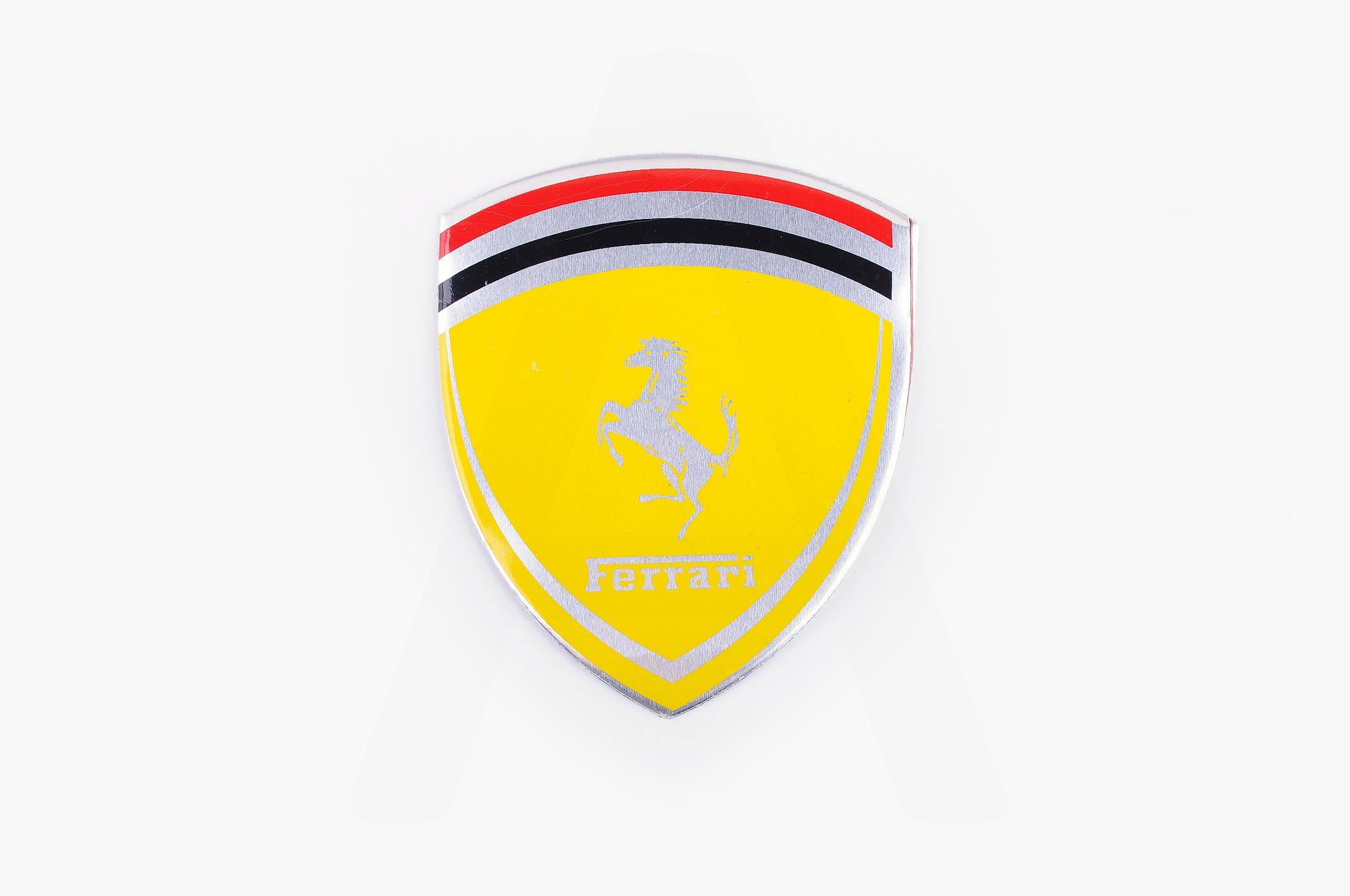 

Наклейка логотип FERRARI (8x9см, алюминий) (#4601)