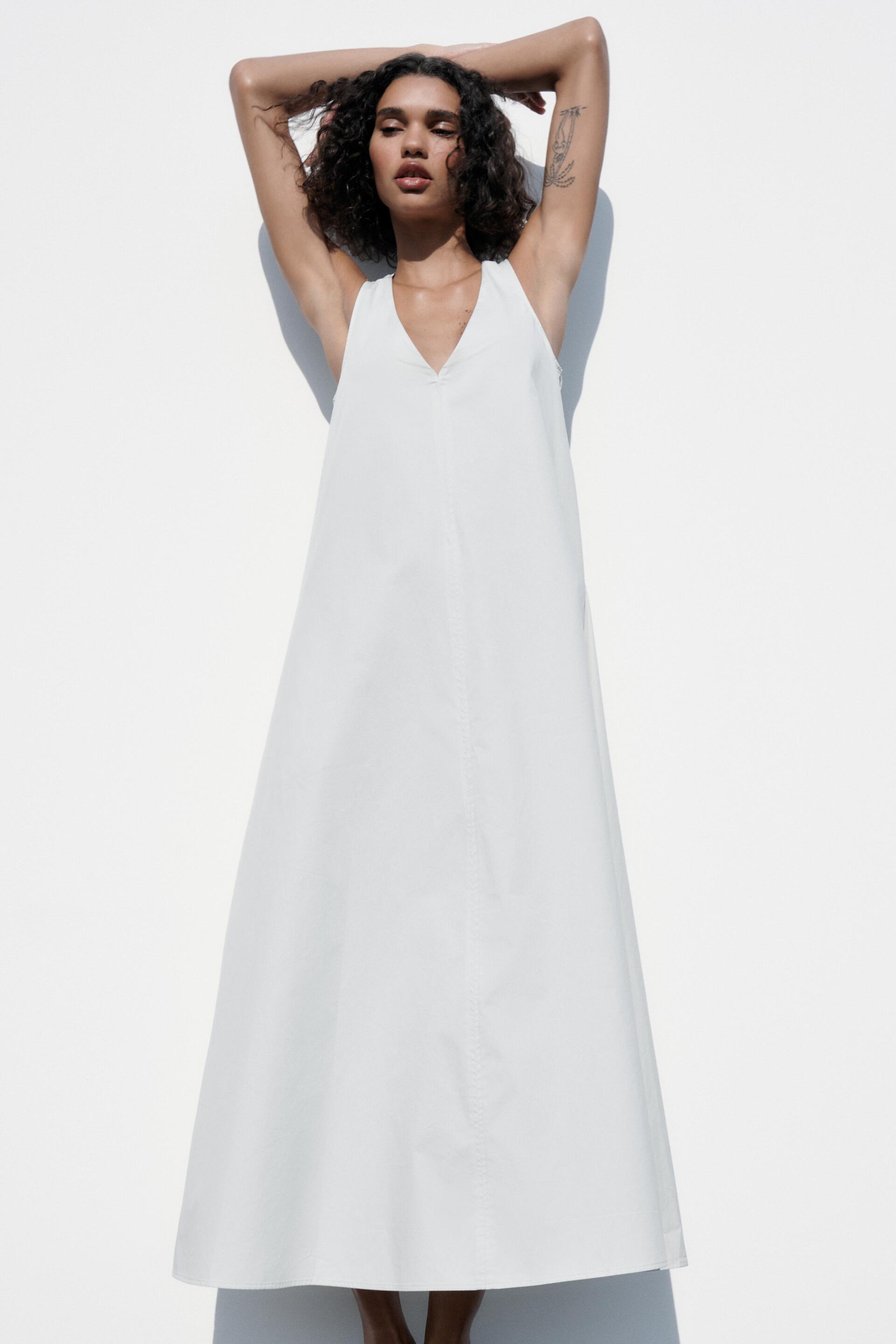 

Платье женское ZARA 02472221 серое L (доставка из-за рубежа), Серый, 02472221