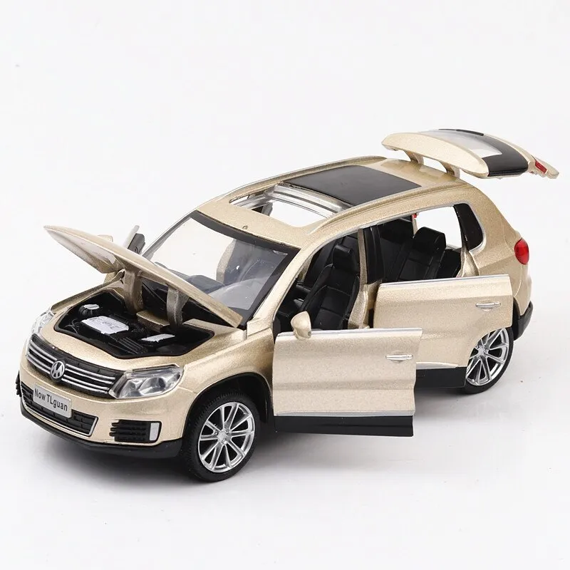 

Модель мет. Volkswagen Tiguan 1:32 инерц. свет, звук,открыв двери баг. и капот 53146/71361