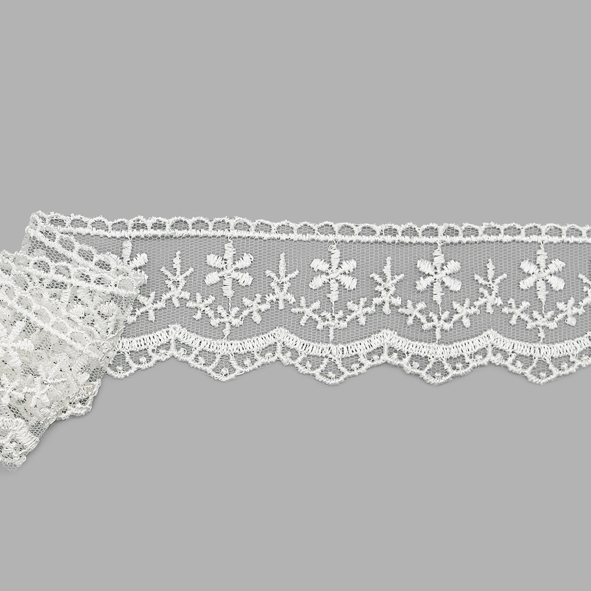 

TR.8B1176 Кружево на сетке 35мм*9м (02 молочный)