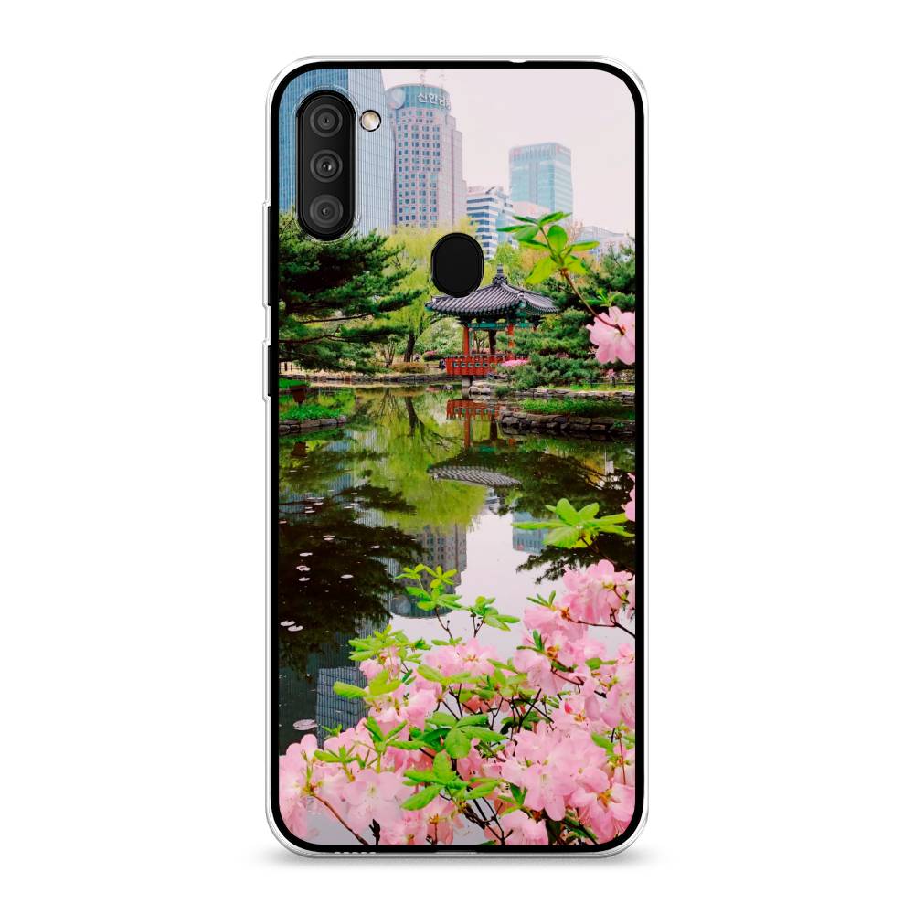 

Чехол на Samsung Galaxy M11 "Сакура возле озера", Зеленый;розовый;голубой, 2100650-2