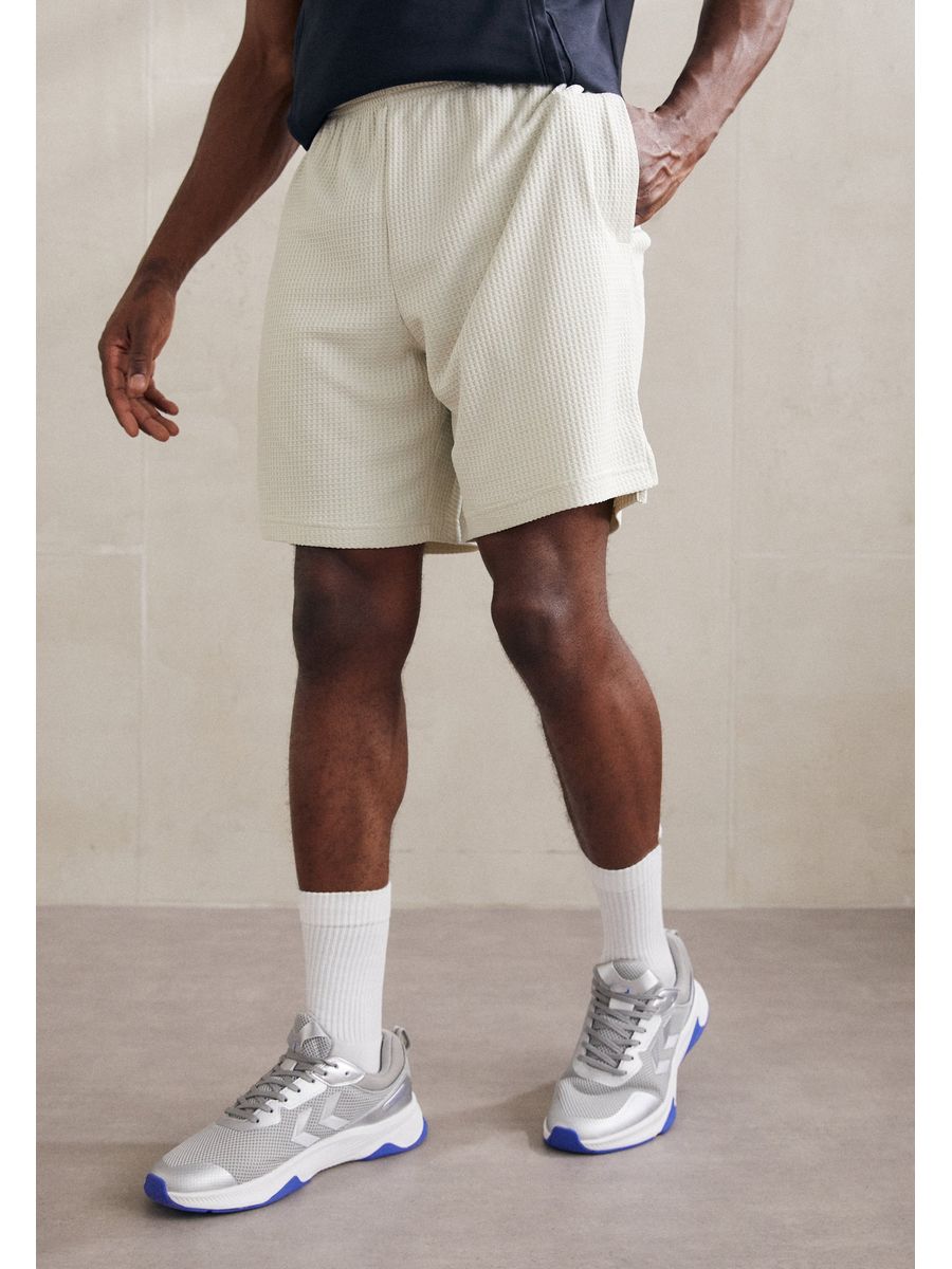 

Спортивные шорты мужские Under Armour UN242E0TE бежевые L, Бежевый, UN242E0TE